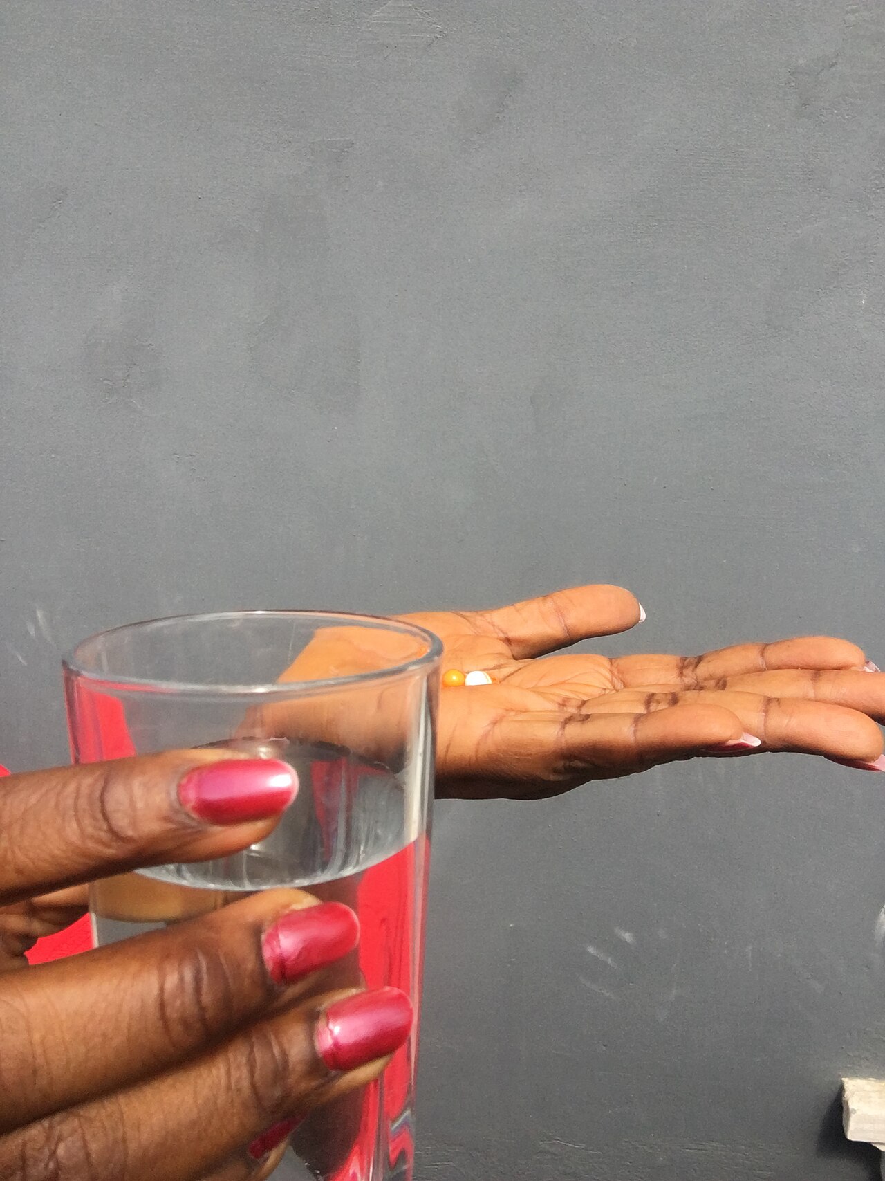 Senior patient discussing Medicare benefits and prescriptions with a clinician during a shutdown planning visit